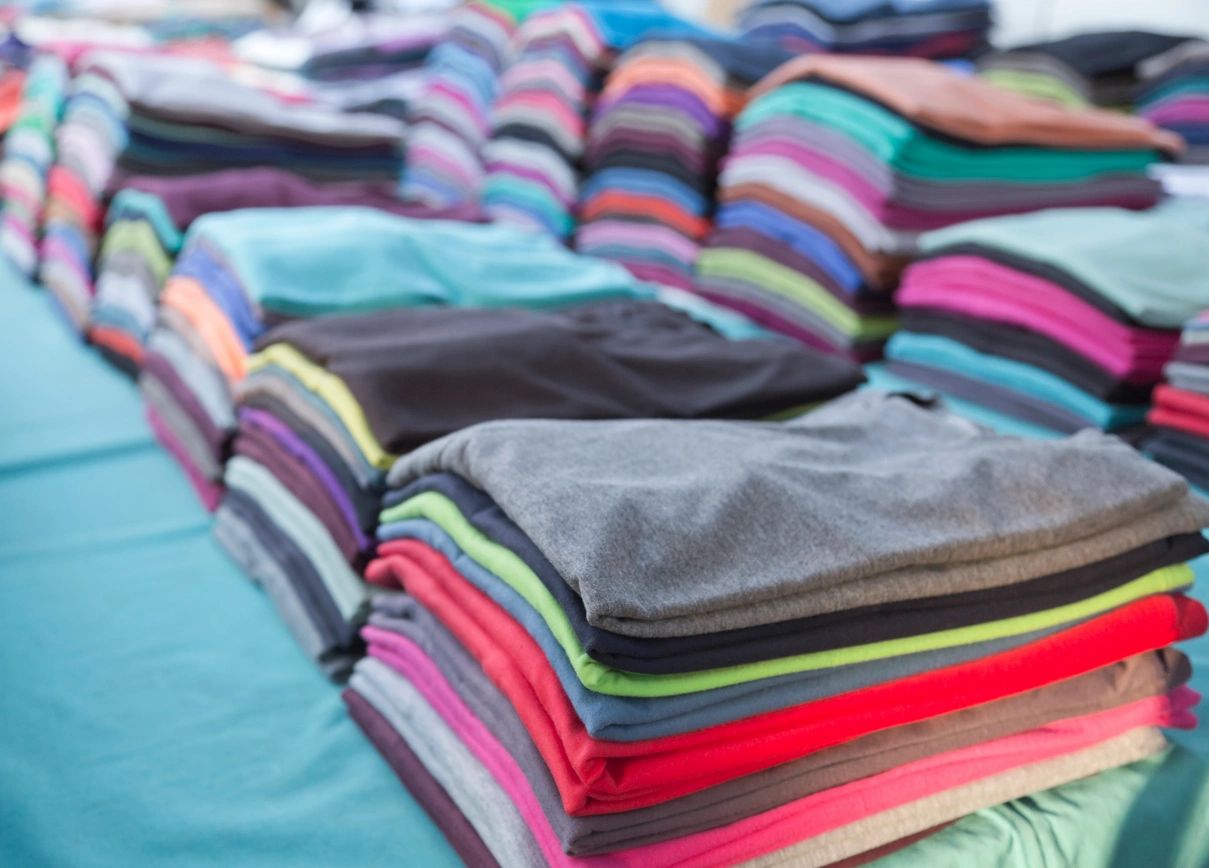 Colorful folded t-shirts and apparel